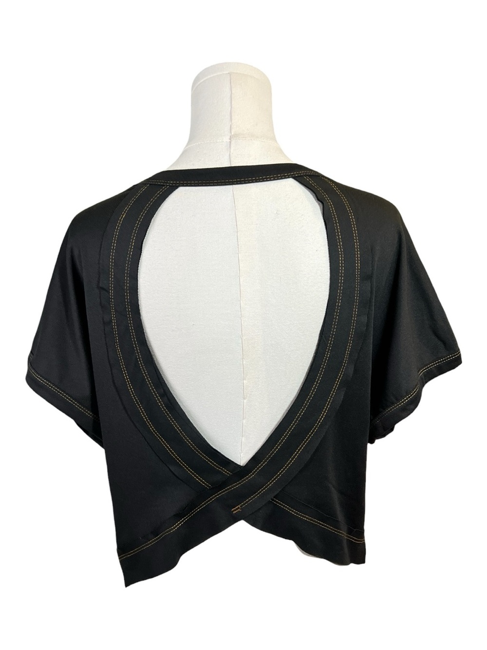 NWOT black backless yoga top with contrast brown stitching | size L